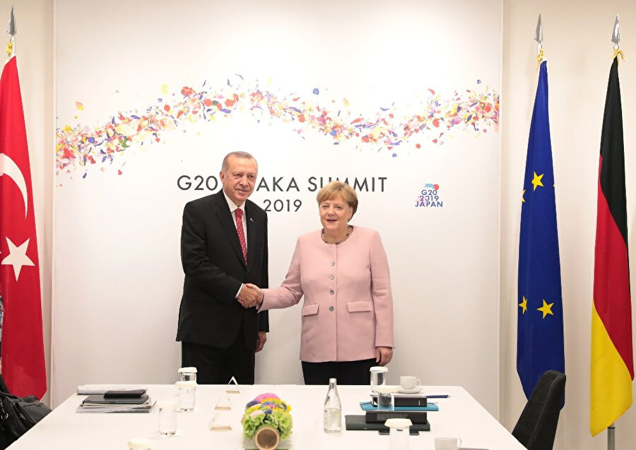 Cumhurbaşkanı Erdoğan, Angela Merkel ile Japonya'da bir araya gelmişti.