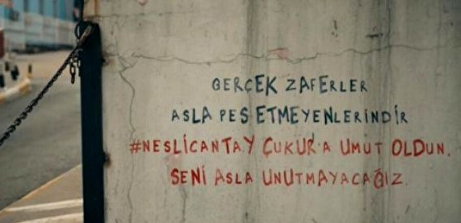 Çukur dizisinde, Neslican Tay için yazılan duvar yazısı