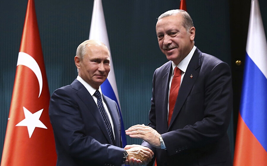 Cumhurbaşkanı Erdoğan ve Putin'in daha önce gerçekleştirdikleri görüşmeden bir kare...