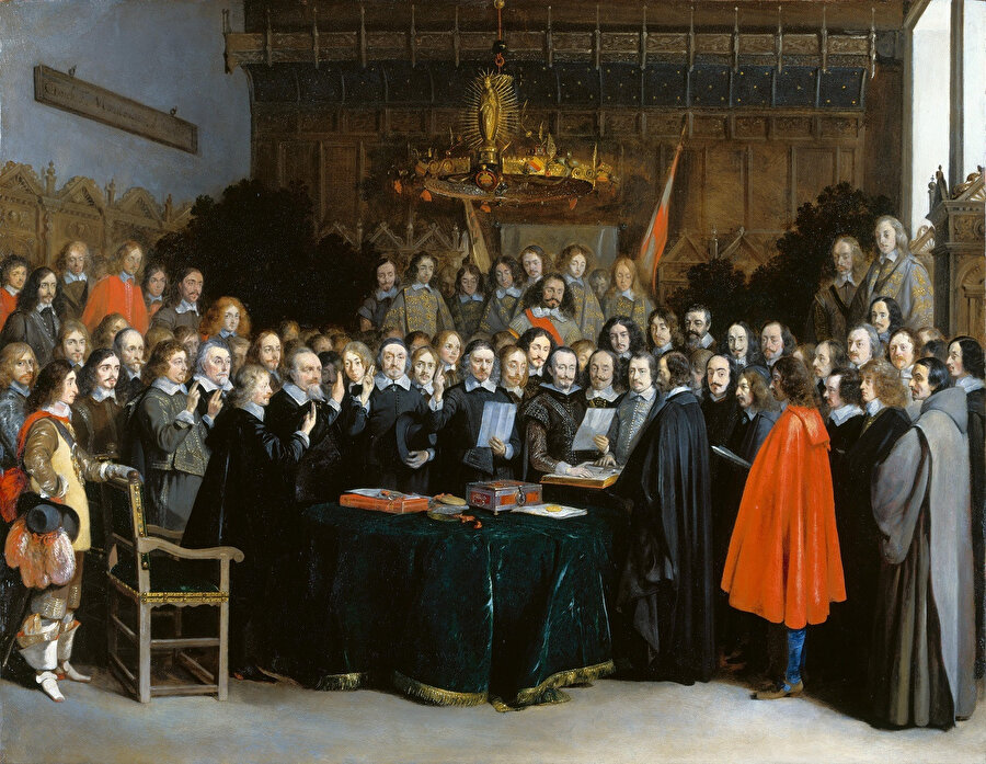 Vestfalya Antlaşması, Avrupa’da 1618 yılında başlayan, 30 Yıl Savaşları ardından sağlanan barış sürecidir. Bu süreç 1648 yılında imzalanan birkaç antlaşmayı da içeren Vestfalya (Westphalia) Barış Antlaşması adını almıştır. Bu anlaşmayı anlatan en meşhur tablo...