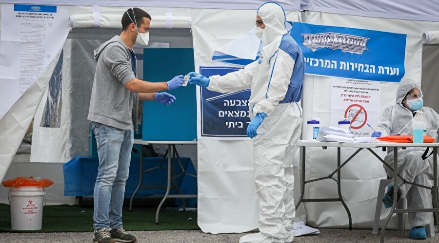 Koronavirüs tedbirlerinin gölgesinde geçen İsrail seçimleri.
