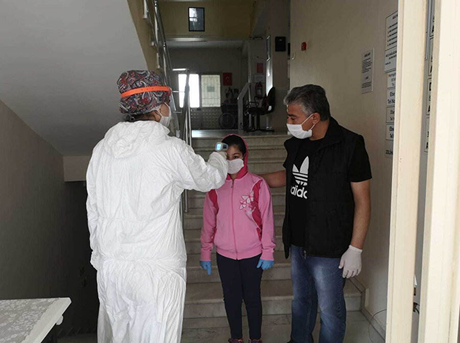 Aile sağlığı merkezlerinde girişte her hastanın ateşi ölçülüyor -DHA