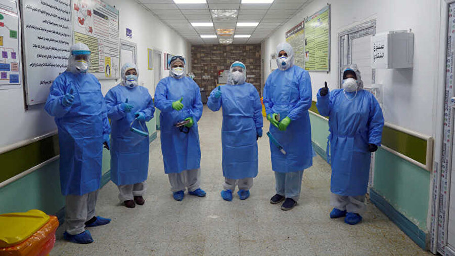 Irak'ta Koronavirüse karşı mücadele eden hemşireler ve gönüllü sağlık çalışanları.