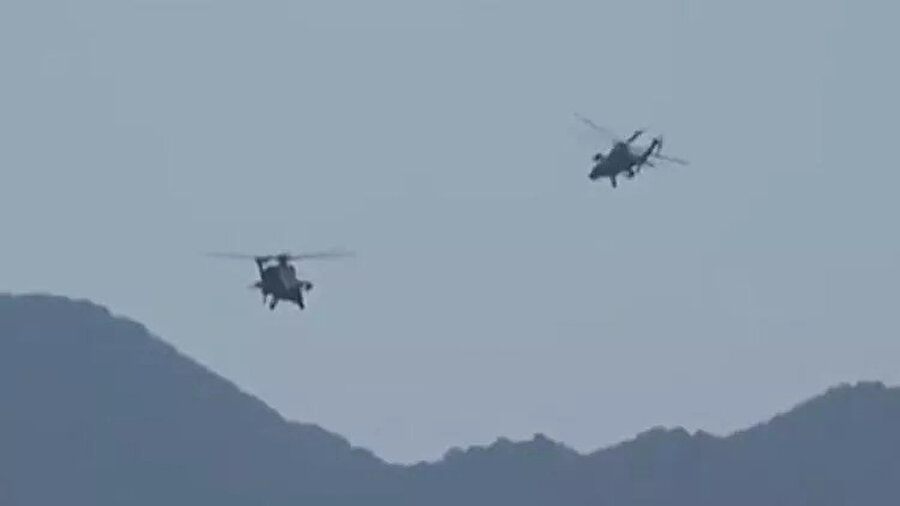 Helikopterler bölgenin üzerinde uçuyor