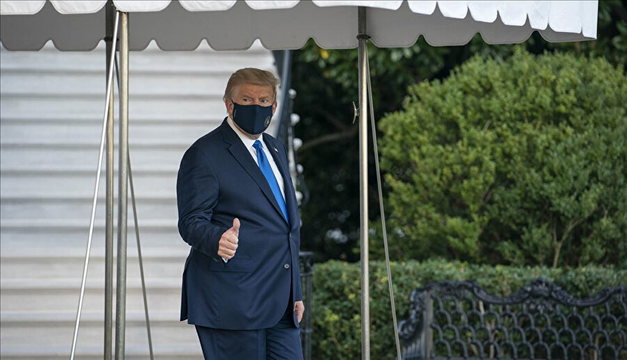 Trump hastaneye götürülürken iyiyim anlamında işaret yaptı