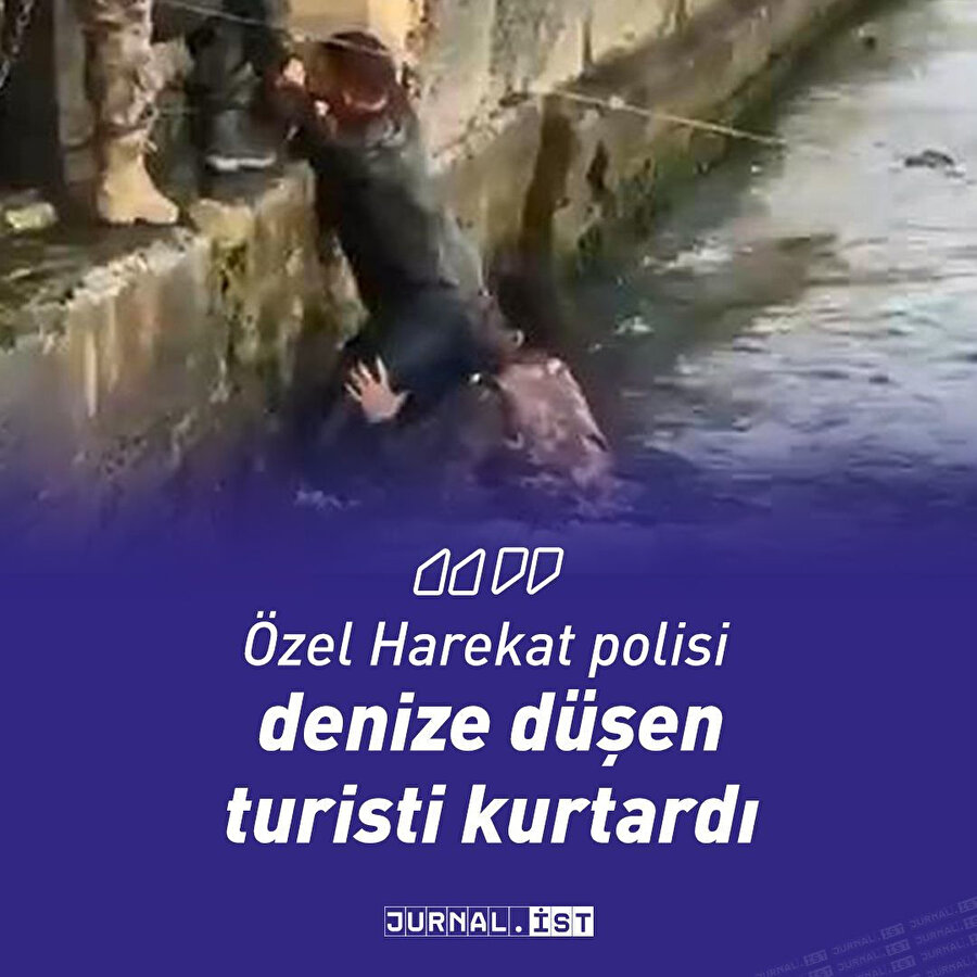 Polisin turisti kurtardığı anlardan görüntü
