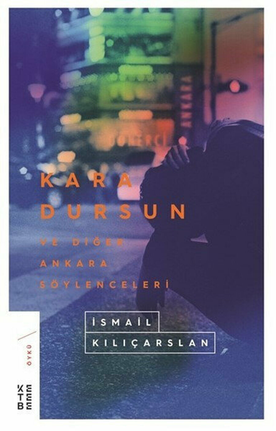 Dursun’un gömleğiyle kravatında Es Turizm yazıyordu. 