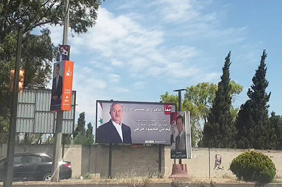 Suriye devlet başkanlığı seçimlerinde aday olduğu iddia edilen Mahmut Ahmet Meri'ye ait bir seçim afişi.
