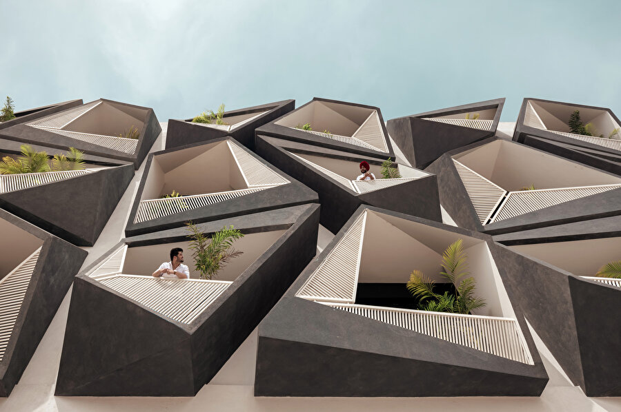 Parametrik tasarımla oluşturulan balkonlar, ofis çalışanlarının molalarında vakit geçirebilecekleri özel alanlar tanımlıyor. 