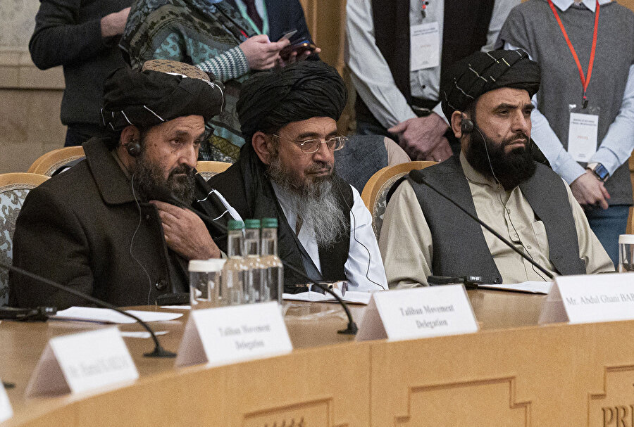 Taliban Siyasi Büro Başkanı Abdul Gani Birader (solda), Taliban'ın Afganistan'da devam eden 40 yıllık savaşı sonlandırmak istediğini açıkladı.
