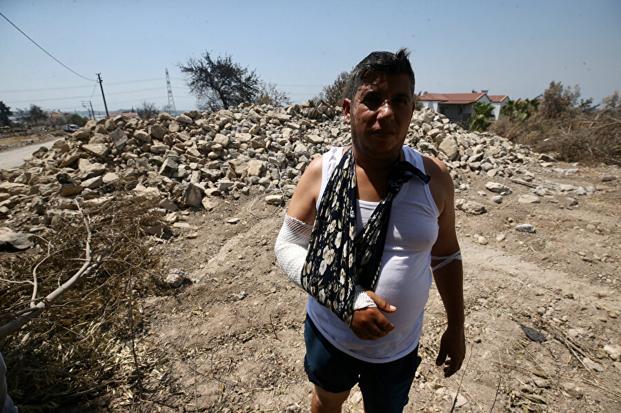 Anne ve babasını kurtarmak için alevlerin arasına daldı