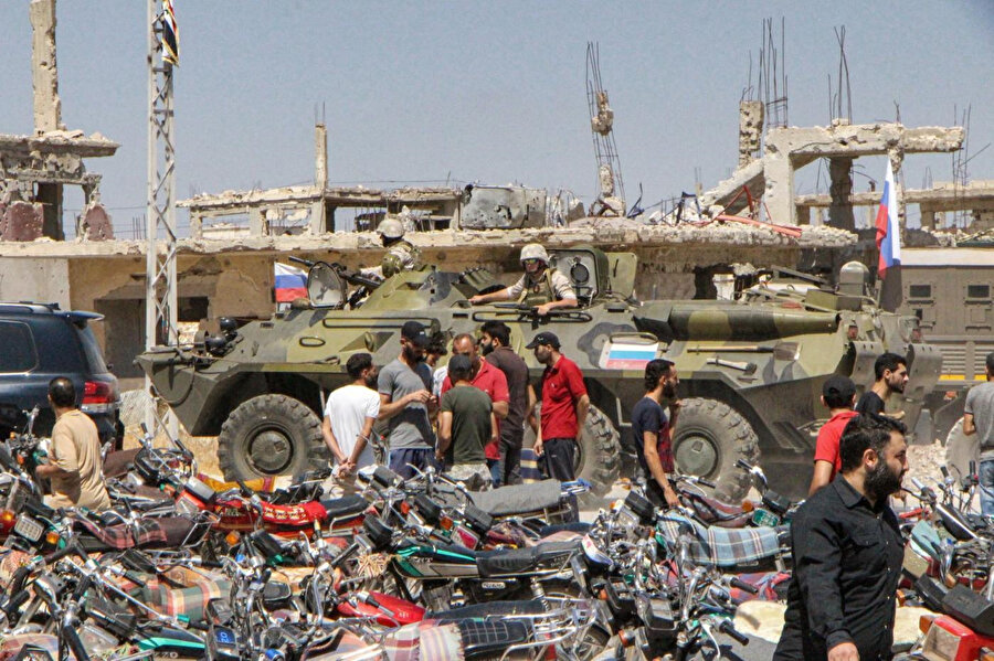 Esed güçleri Rus destekli milislerle Dera el-Beled'de arama çalışmalarına başladı. 