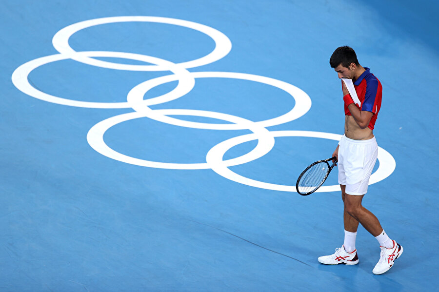 Novak Djokovic'in davayı kazanmasına rağmen Avustralya Açık'a katılım hakkı belirsizliğini koruyor. 
