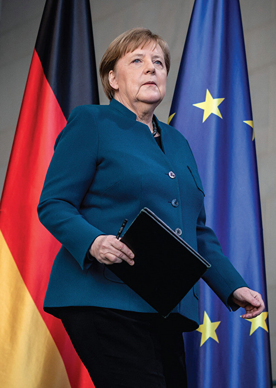 Angela Merkel-Almanya Şansölyesi.