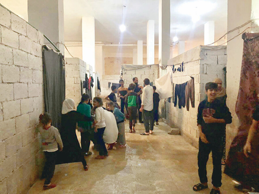 El Bab’daki yer altı şehrinde yaşayan insanlar, burayı ‘’güneşi görmeyen şehir’’ olarak özetliyorlar.