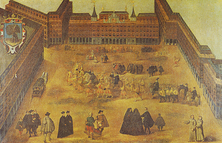 » Çığlık ve itirafların kanlı meydanı: Madrid’deki Plaza Mayor’den (Ana Meydan) İspanya Kralı III. Philip’in (1578-1621) geçiş anını gösteren bu resim Madrid’deki Municipal Museum’da sergileniyor. Şehrin bu meşhur meydanı nice auto-da-fe törenine tanıklık etmiştir. Bugün şehri ziyaret edenler meydanın neredeyse hiç değişmediğini görürler.