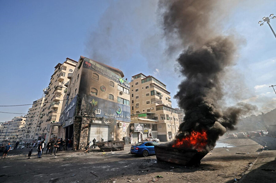 Şuafat Mülteci Kampı'na İsrail baskınını protesto eden Filistinliler, 10 Ekim 2022.