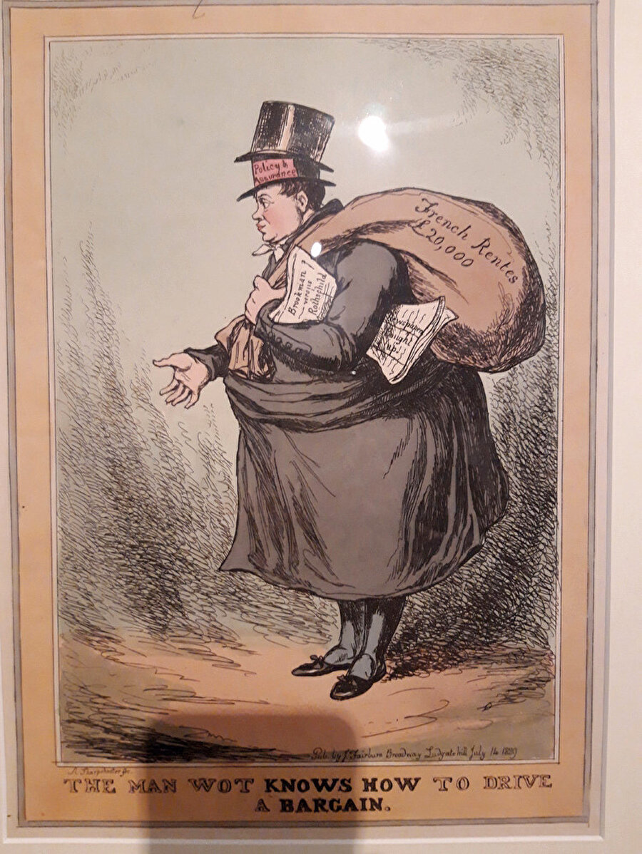 ‘Nasıl pazarlık yapılacağını bilen adam’ - Londra 1829 - Baron Meyer de Rotschild’i eski giyimli bir Yahudi olarak betimleyen karikatür. İster bankacılar ister dilenciler, Yahudilere güvenilmez. (Yahudi müzesi, Londra). 