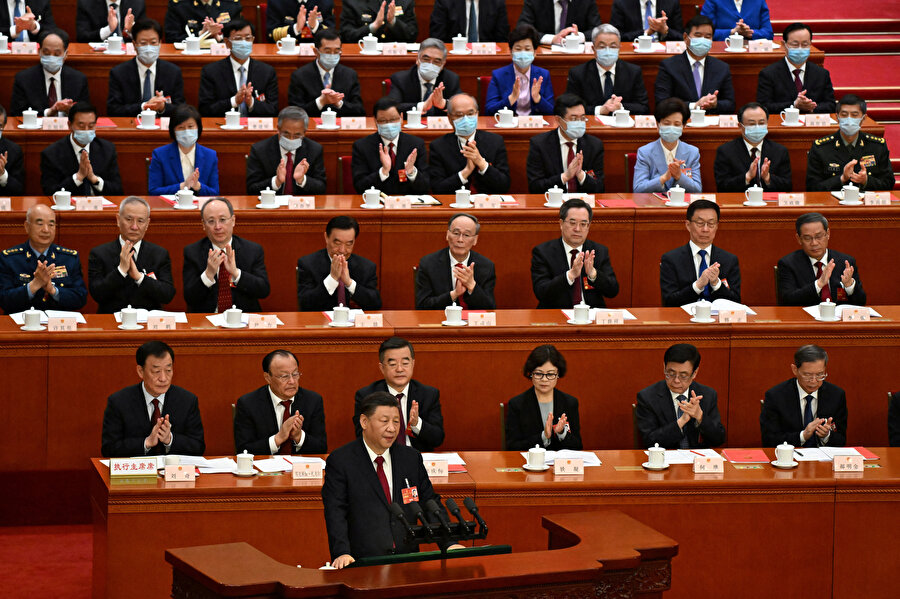 Çin Devlet Başkanı Xi Jinping, 13 Mart 2023'te Pekin'deki Büyük Halk Salonunda Ulusal Halk Kongresi'nin (NPC) kapanış oturumunda konuşuyor.
