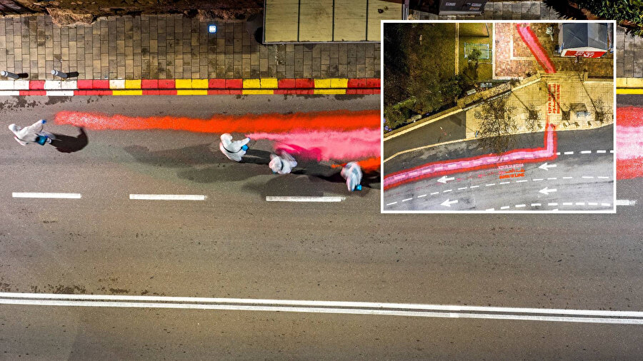 Batı Kudüs'teki bir grup eylemci İsrail Yüksek Mahkemesinin önündeki 'yürüyüş yolunu' pembe ve kırmızı şeritle boyadı