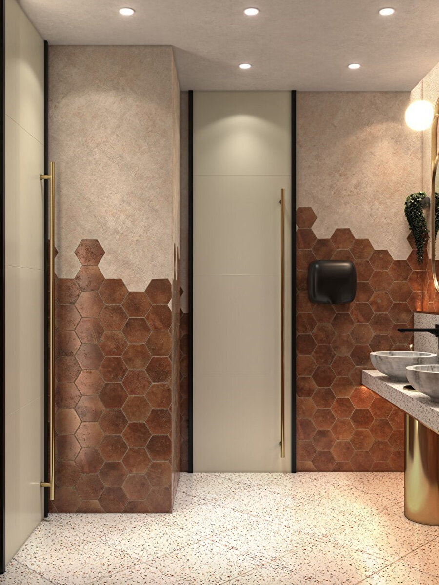 Tuvalet bölümünün kapı tasarımı, şekil ve form detayları ile mekana farklı bir hava katıyor. Minimalist İtalyan tasarımı tuvalet bölümünde de dikkat çekmeyi başarıyor. 