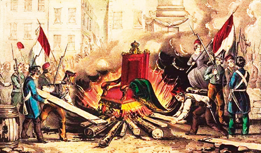 1848 ihtilalinde Fransız kralı Louis Philippe’nin tahtı yakılıyor.