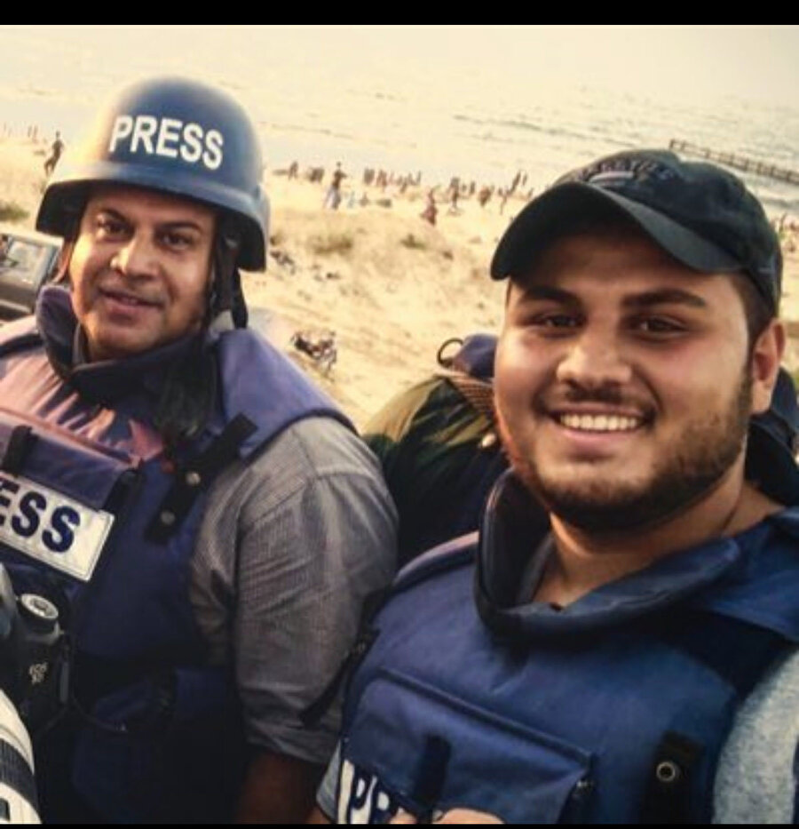 Vail ed-Dahduh’un (solda) İsrail saldırısında hayatını kaybeden 27 yaşındaki oğlu Hamza ed-Dahduh da foto muhabirliği yapıyordu.