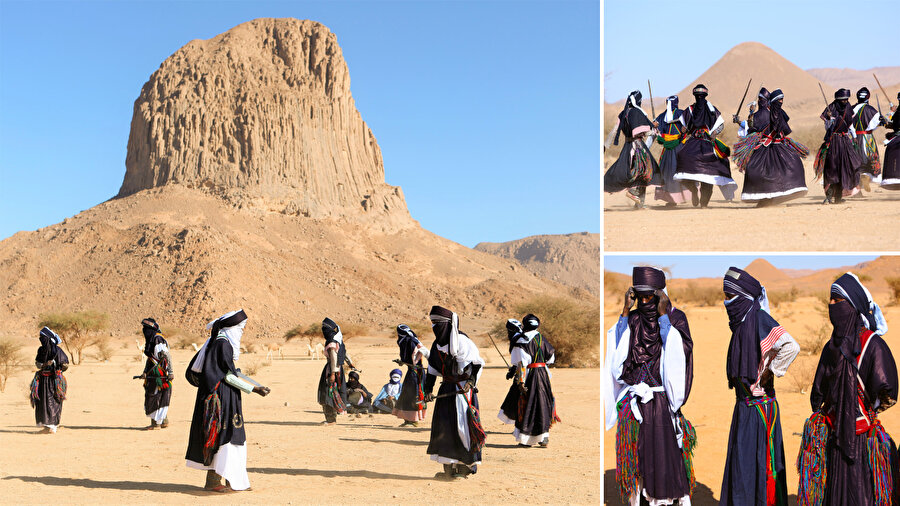 Cezayir'in güneyindeki Tamanrasset vilayetinde bulunan Hakkar Sıradağları'nın eteklerindeki çölde yaşayan Tuaregler, geleneksel Takuba Ağar dansını sergiliyor.