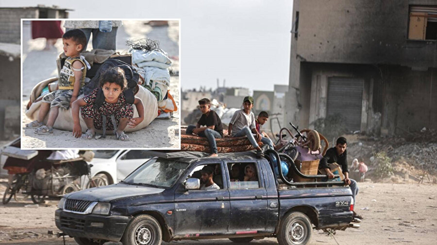 Han Yunus'un doğusunda yüzlerce kişi, İsrail'in bölgenin boşaltılması çağrısı sonrası kentin batısına göç etti. 