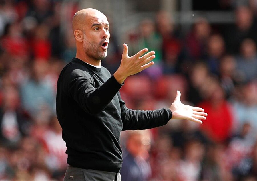 UEFA, Manchester City'nin İspanyol teknik direktörüne biri ertelemeli iki maçtan men cezası verdi.