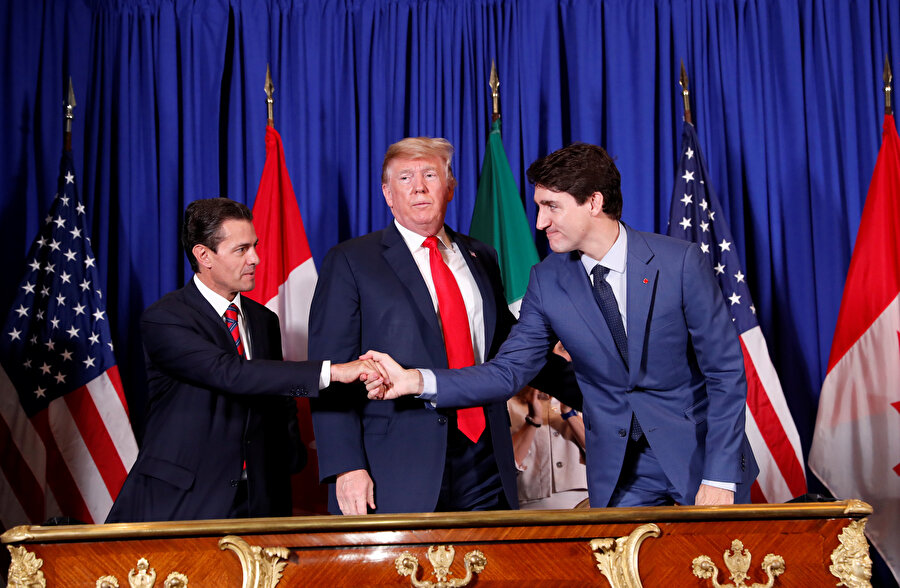 ABD Başkanı Trump, Kanada Başbakanı Trudeau ve Meksika Devlet Başkanı Pena Nieto törenden sonra basına poz verdi.