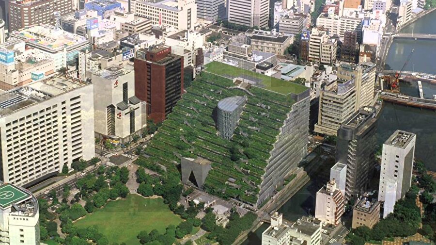 ACROS

                                    Japonya'nın Fukuoka şehrinde bulunan Acros isimli bina, ilginç mimarisiyle dikkat çekiyor. Arjantinli mimar Emilio Ambasz tarafından yapılan 14 katlı binanın her katı adeta bir ormana yerleştirilmiş gibi görünüyor. Her katta; göletler, şelaleler ve ağaçlar bulunuyor. Yapının tamamında elli binden fazla bitki ve ağaç bulunuyor.
                                