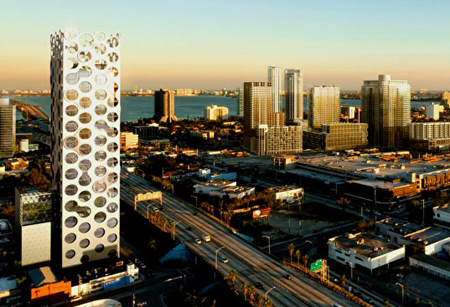 COR Building (Miami, ABD)
Doğa dostu bu ilginç bina, güneş ışığıyla su ısıtan sistemler, fotovoltaik paneller ve rüzgar tribünleri de dahil olmak üzere yeşil teknolojilerle donatılmış, ticari ve ikamet şeklinde karma bir yapıya sahiptir. 

 Chad Oppenheim Mimarlık, tasarım ve enerji danışmanı Buro Happold ve yapı tasarım mühendisi Ysreal Seinuk'un işbirliğiyle yapılmıştır. COR binasını maliyeti 40 milyon dolar olmuştur. 

 Toplamda COR, 113 konut, 1868 metrekare ofis alanlarıyla 502 metrekare perakendeci alanına sahip.
