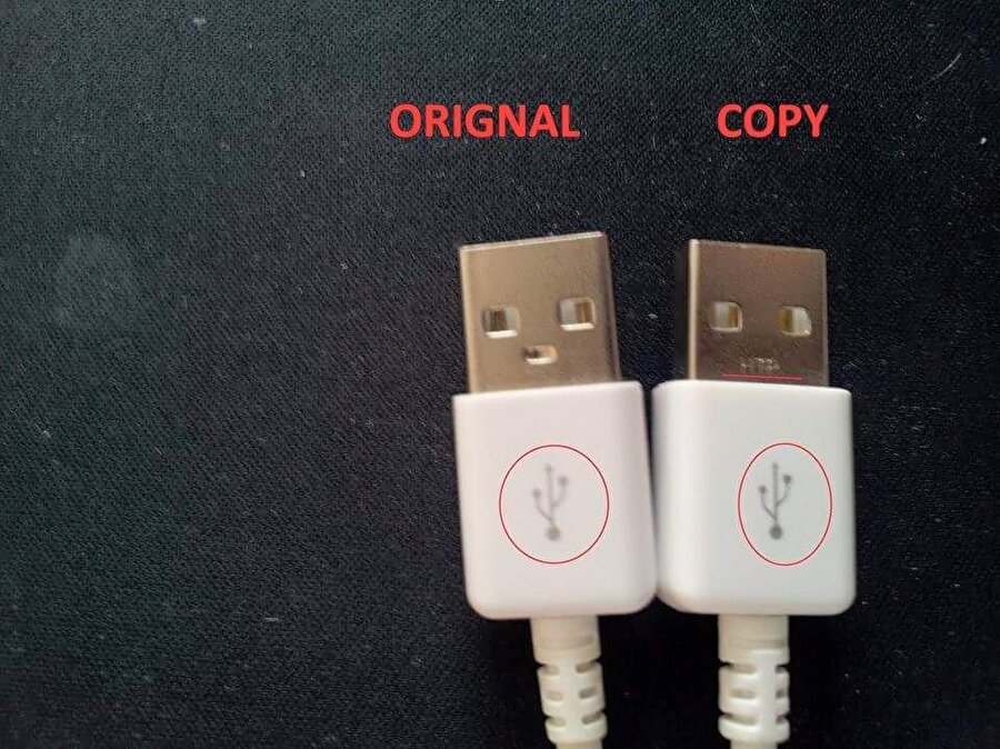Sahte USB girişinde bulunan işaret daha kalın yani daha belirgin olur.

                                    
                                