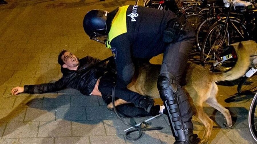 "Polis bir anda saldırdı"

                                    Olayı güçlükle anlatan Halil İbrahim Kurt, Konsolosluğun önüne vardıklarında Hollanda polisinin her tarafı kapattığını ve ne olduğunu anlamadan polisin bir anda saldırdığını söyledi.
                                