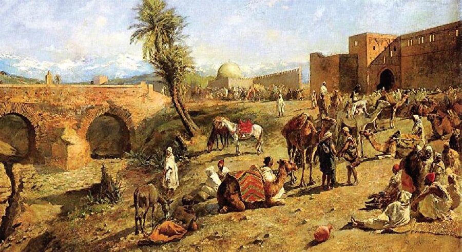 Edwin Lord Weeks’e ait “Arrival of a Caravan Outside the City of Morocco” (Kervanın Fas’a varışı) adlı bu yağlı boya tabloda bir oryantalist gözünden Arap tüccarlar resmedilmiş (1882). Hz. Ali yanlıları 780-974 arasında bu topraklarda İdrisîler adıyla hüküm sürmüştü.