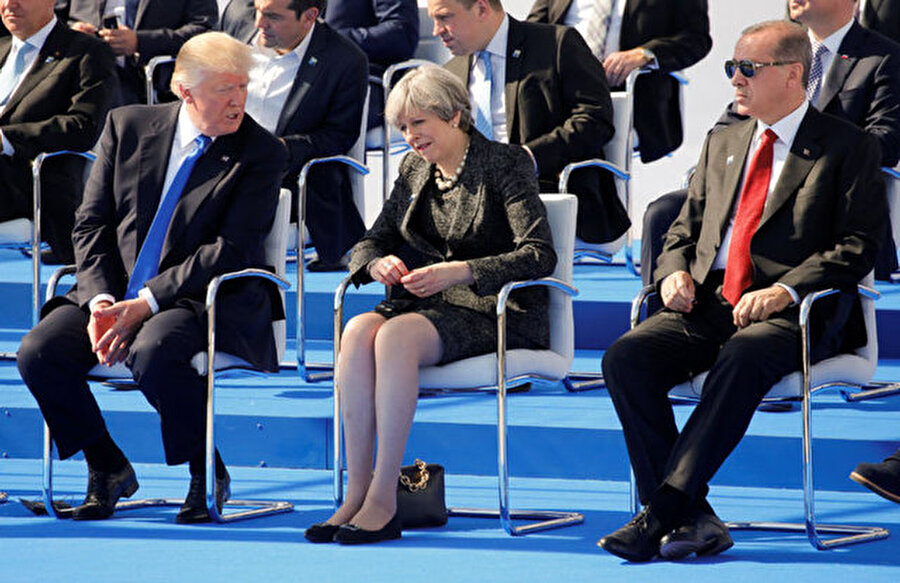 
                                    
                                    Erdoğan ABD Başkanı Trump ve İngiltere Başbakanı Theresa May ile birlikte gösterileri izledi.
                                
                                