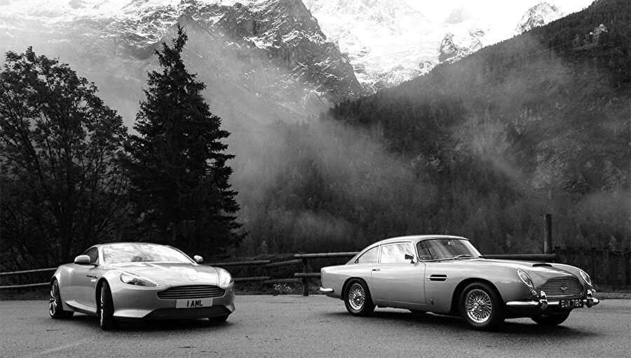 Aston Martin DB9 vs. DB5
1964 yılında üretimine başlanan Aston Martin DB5'in 4.0 litrelikik 6 silindirli motoru, 4 ve 5 ileri manuel ya da 5 kademeli otomatik şanzımanı vardı. DB-9 ise ilk kez 2004 yılında üretime başladı. DB9 atasından oldukça hızlı. Aston Martin V12 Vanquish'ten alınan 5.9 L V12 motor ile güçlendirilmiş olun aracın son hızı 295 km/h'dir (183 mph) ve 0–100 km/h hıza 4.1 saniyede çıkmaktadır.