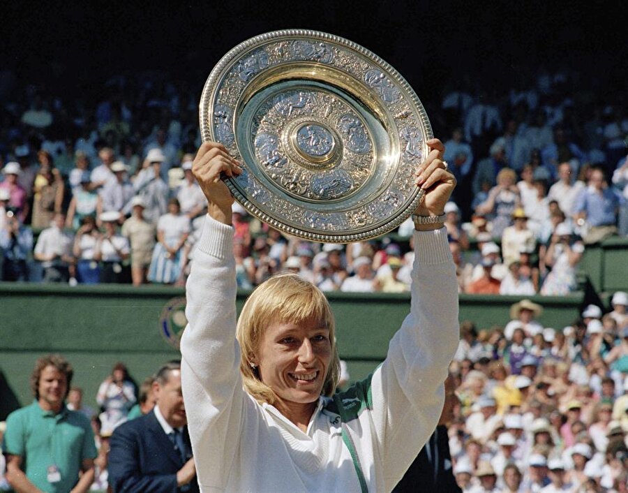 En fazla maça çıkan

                                    Erkekler: *Jean Borotra (Fransa) - 223 maç

  
Kadınlar: Martina Navratilova (ABD) - 326Not: * Açık dönem (1968 yılında profesyonel tenisçilerin, amatör oyuncularla karşılaşmasına izin verilmesi) öncesinde kazanılan şampiyonluklar dahil.
                                