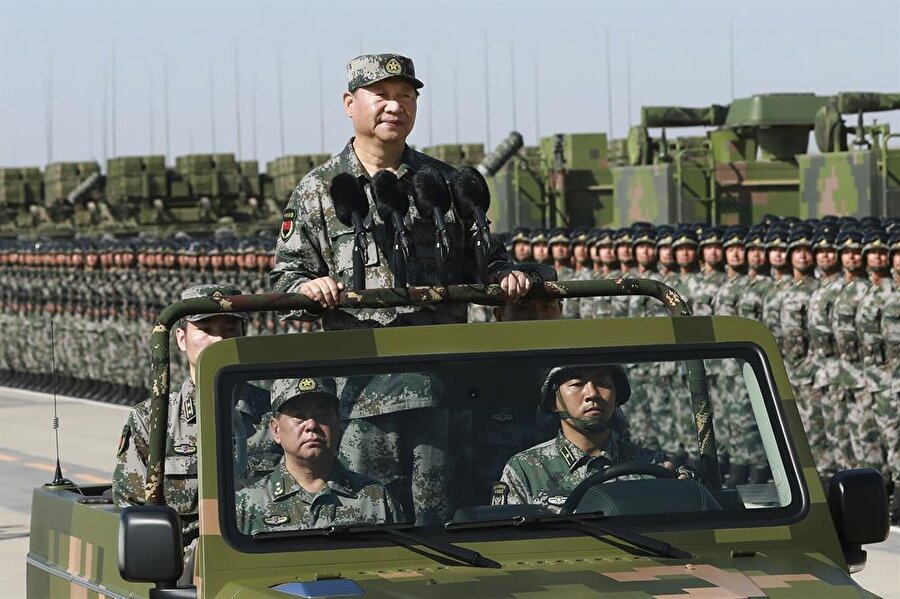 Çin Ordusu, 90'ıncı kuruluş yıl dönümü kutlamaları kapsamında askeri geçit töreni düzenlendi. Çin lideri Şi Cinping, “Güçlü bir orduya her zamankinden daha çok ihtiyacımız var” dedi.

                                    
                                
