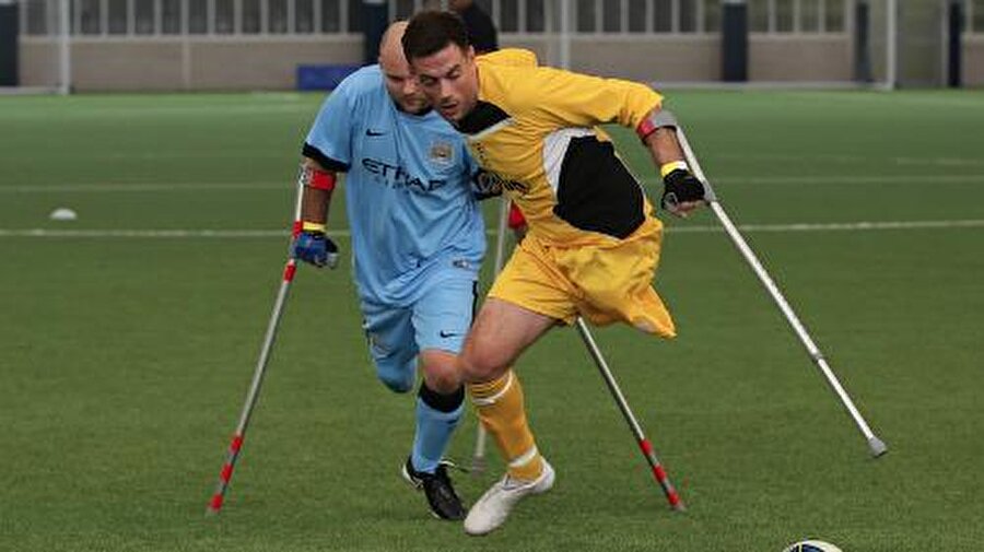 
                                    
                                    Ampute futbolu engelli bireylerin spor yaparak yaşama sıkı sıkı bağlanmaları amacıyla hayata geçirildi.
                                
                                
