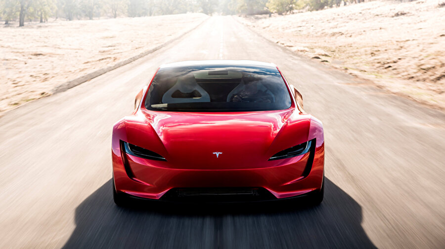 1000 kilometre menzile sahip Tesla Roadster tanıtıldı

                                    Elektrikli tır tanıtımı için Kaliforniya'da basın etkinliği düzenleyen Elon Musk, bir sürpriz yaparak ikinci nesil Tesla Roadster elektrikli spor otomobilini gün yüzüne çıkardı. 1000 kilometre menzile sahip araç, 100 kilometreyi 1,9 saniyede katederek dünyanın en hızlı otomobili olmaya aday. Roadster'in 2020'de satışa çıkması bekleniyor. Rezervasyon bedelini 50 bin dolar olarak belirleyen Tesla, başlangıç modelini 200 bin dolar seviyesinden fiyatlandırmış.
                                