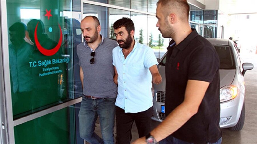 Kolları olmayan zanlı araç kullanırken yakalandı.