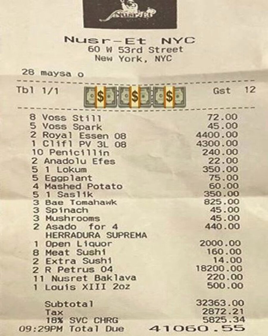 Hesap fişi dudak uçuklattı!
Nusret'in New York'taki restoranındaki hesapta, fişinin en altında ise 5 bin 825 dolarlık 'servis ücreti' dikkat çekti. 5 bin 825 dolar, TL'ye çevrildiğinde yaklaşık 40 bin TL ediyor.