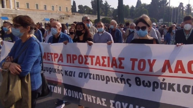 Wildfire, flood victims hold protest in Athens
