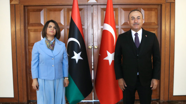 Turkey's Foreign Minister Mevlut Cavusoglu and his Libyan counterpart Najla Mangoush