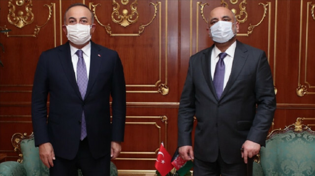 Turkish Foreign Minister Mevlut Cavusoglu (L) meets Afghanistan Foreign Minister Hanif Atmar (R) ( Cem Özdel - Anadolu Agency )