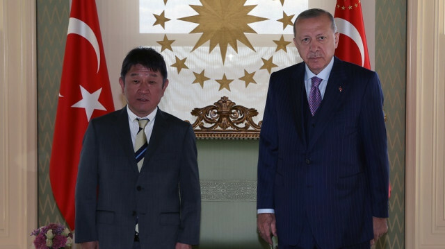 Turkish President Recep Tayyip Erdogan (R) poses for a photo with Japanese Foreign Minister Toshimitsu Motegi (L) prior to their meeting at the Vahdettin Mansion, in Istanbul, Turkey on August 20, 2021.