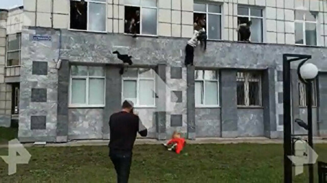 Students jump from windows to escape gunman
