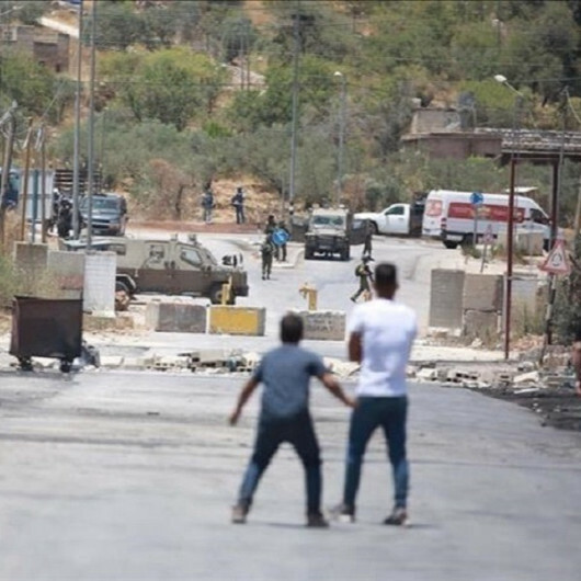 Three Palestinians injured in attack by settlers in West Bank